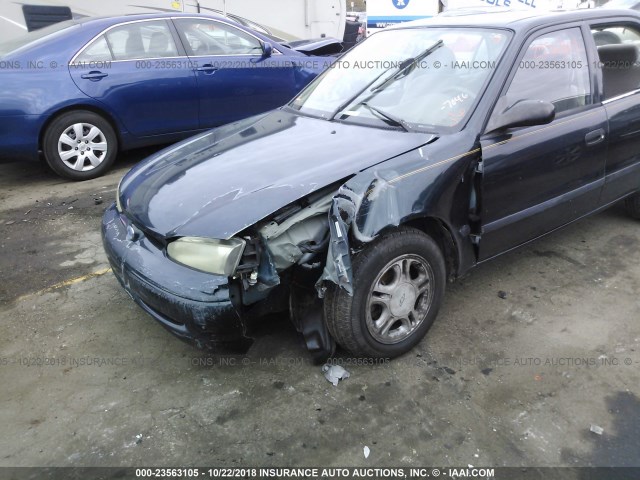 1Y1SK5284XZ447046 - 1999 CHEVROLET GEO PRIZM LSI GREEN photo 6