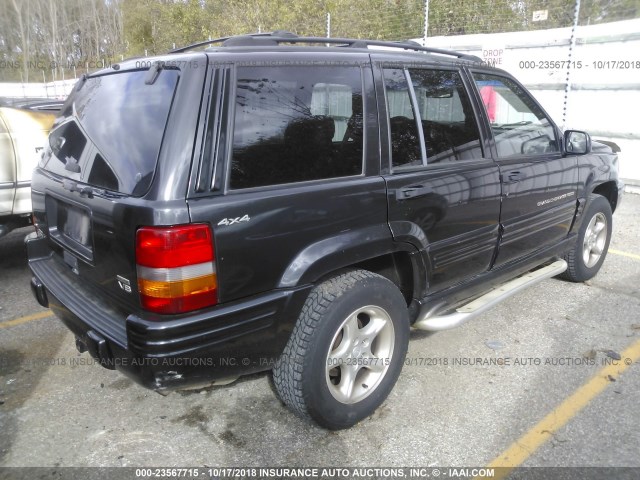 1J4GZ88Z1WC208265 - 1998 JEEP GRAND CHEROKEE LIMITED 5.9L BLACK photo 4