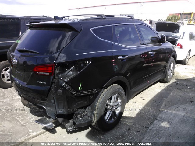 5NMZU3LB5JH055474 - 2018 HYUNDAI SANTA FE SPORT  BLACK photo 4