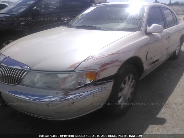 1LNHM97V3XY703211 - 1999 LINCOLN CONTINENTAL  WHITE photo 6