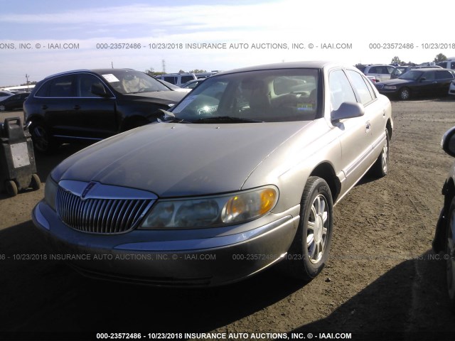 1LNHM97V62Y700750 - 2002 LINCOLN CONTINENTAL  GOLD photo 2