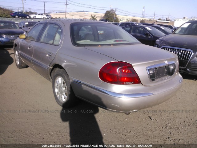 1LNHM97V62Y700750 - 2002 LINCOLN CONTINENTAL  金色 照片 3