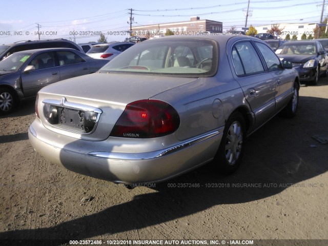 1LNHM97V62Y700750 - 2002 LINCOLN CONTINENTAL  金色 照片 4