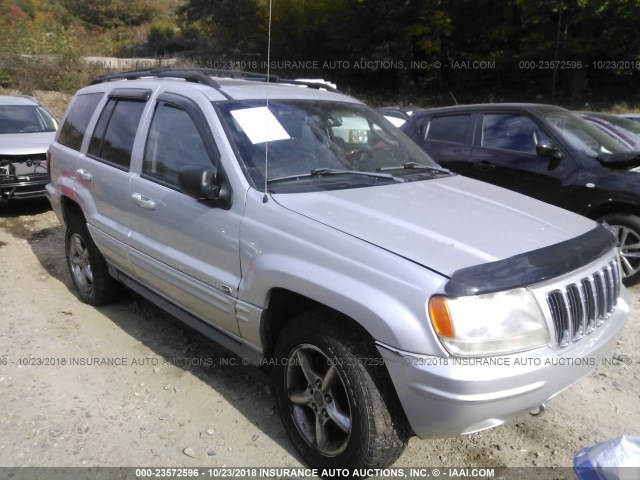 1J8GW68J32C251621 - 2002 JEEP GRAND CHEROKEE OVERLAND SILVER photo 1