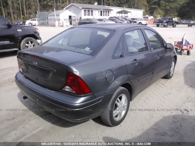 1FAFP38Z34W112102 - 2004 FORD FOCUS ZTS GRAY photo 4