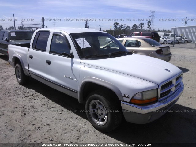 1B7GL2AZ2YS669143 - 2000 DODGE DAKOTA QUAD WHITE photo 1