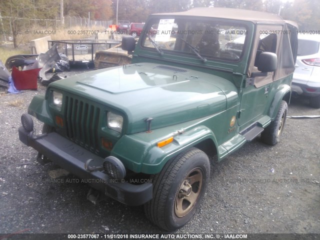 1J4FY49S8RP470290 - 1994 JEEP WRANGLER / YJ SAHARA GREEN photo 2