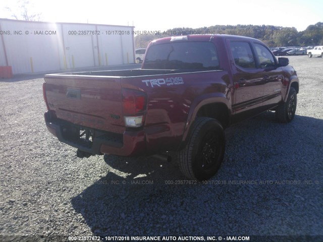 5TFCZ5AN2GX007799 - 2016 TOYOTA TACOMA DBL CAB/SR/SR5/TRD SPT/OR RED photo 4