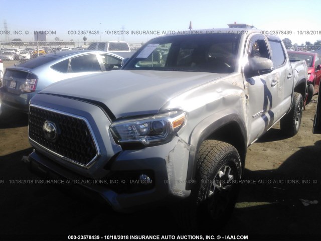 3TMCZ5ANXJM141604 - 2018 TOYOTA TACOMA DBL CAB/SR/TRDSPT/OR/PRO GRAY photo 2