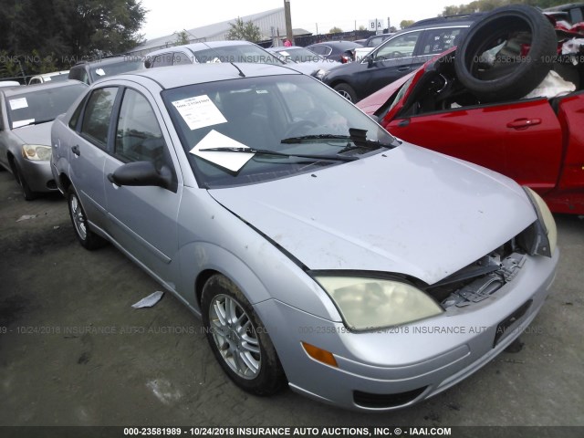 1FAFP34N95W131998 - 2005 FORD FOCUS ZX4 SILVER photo 1