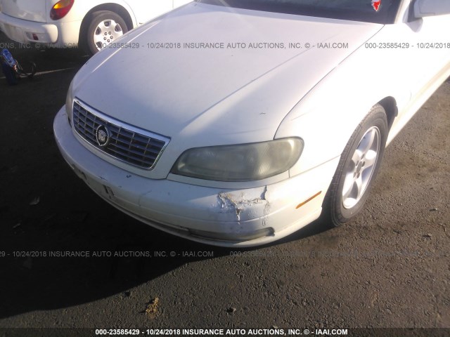 W06VR54R7YR068192 - 2000 CADILLAC CATERA WHITE photo 6