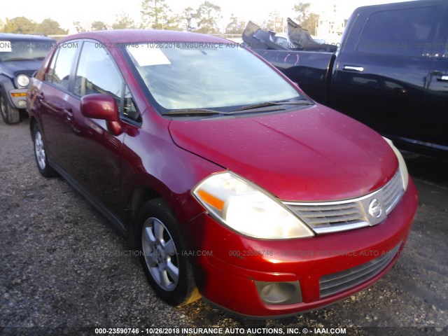 3N1BC11E49L397361 - 2009 NISSAN VERSA S/SL RED photo 1