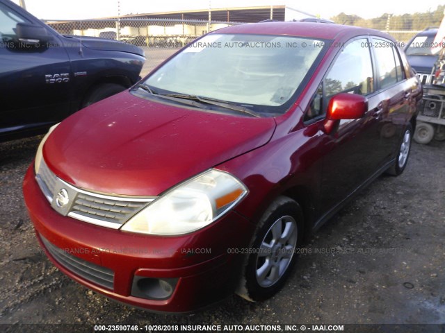 3N1BC11E49L397361 - 2009 NISSAN VERSA S/SL RED photo 2