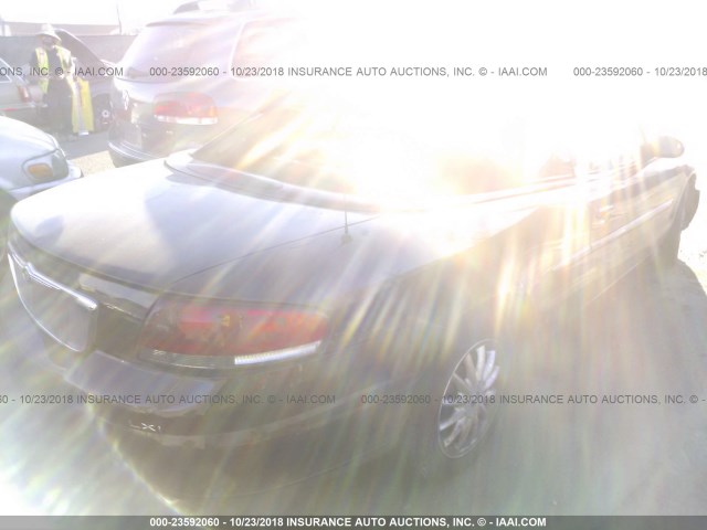 1C3EL55U81N602899 - 2001 CHRYSLER SEBRING LXI BLACK photo 4