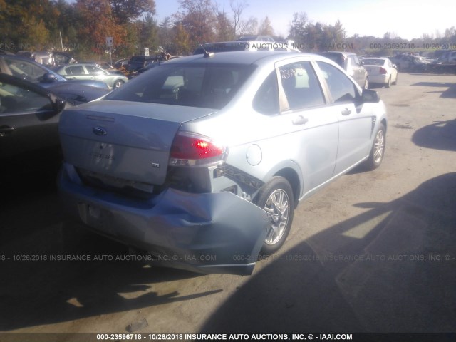 1FAHP35N38W135587 - 2008 FORD FOCUS SE/SEL/SES Light Blue photo 4