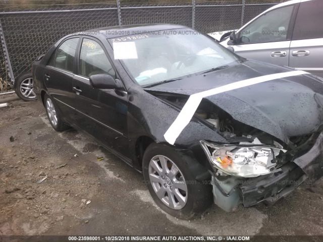 4T1BF32K42U018984 - 2002 TOYOTA CAMRY LE/XLE/SE BLACK photo 1