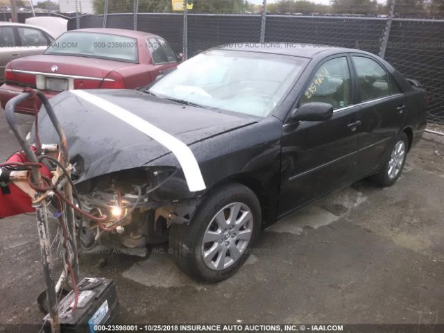 4T1BF32K42U018984 - 2002 TOYOTA CAMRY LE/XLE/SE BLACK photo 2