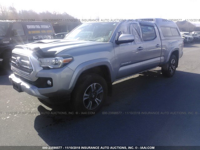 3TMDZ5BN9HM033133 - 2017 TOYOTA TACOMA DBL CAB/SR5/TRD SPORT/OR SILVER photo 2