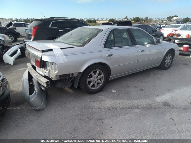 1G6KY5493YU139084 - 2000 CADILLAC SEVILLE STS SILVER photo 4