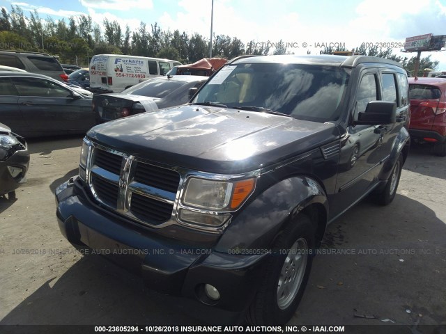 1D4PT2GK2BW536945 - 2011 DODGE NITRO SE GRAY photo 2