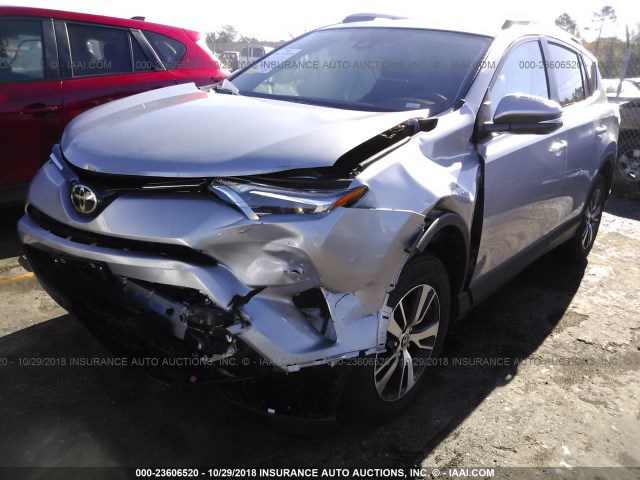 2T3RFREV7JW808793 - 2018 TOYOTA RAV4 ADVENTURE/XLE SILVER photo 6