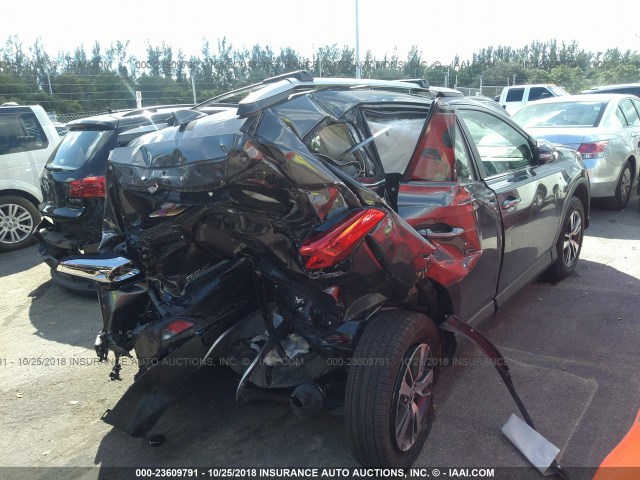 JTMWFREV2JJ159891 - 2018 TOYOTA RAV4 ADVENTURE/XLE Boz foto 4