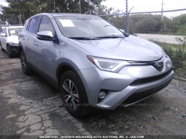 2T3RFREV6JW748974 - 2018 TOYOTA RAV4 ADVENTURE/XLE SILVER photo 1