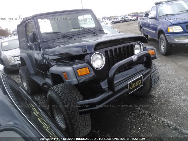 1J4FA39S83P344033 - 2003 JEEP WRANGLER COMMANDO/X BLACK photo 1