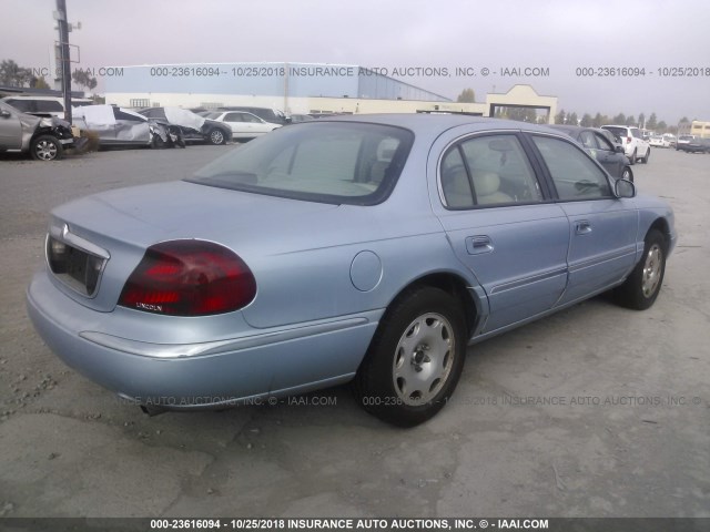 1LNFM97V1WY714231 - 1998 LINCOLN CONTINENTAL  Niebieski zdjęcie 4