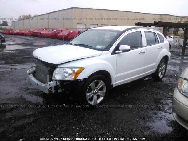 1B3CB3HA7BD255148 - 2011 DODGE CALIBER MAINSTREET WHITE photo 2