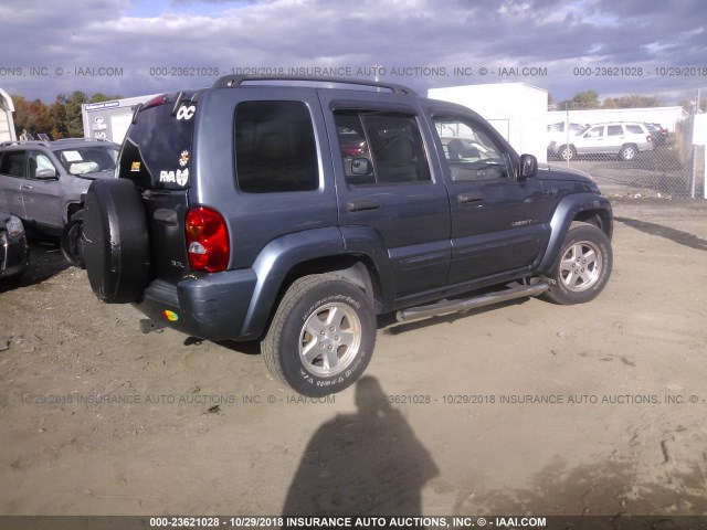 1J4GK58K92W313389 - 2002 JEEP LIBERTY LIMITED BLUE photo 4