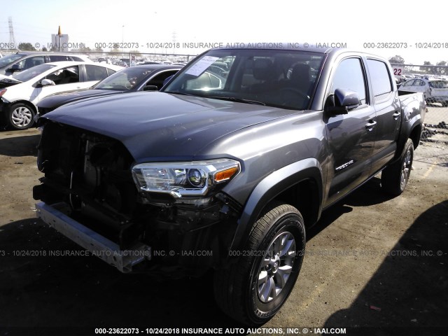 3TMAZ5CN7HM038302 - 2017 TOYOTA TACOMA DBL CAB/SR5/TRD SPORT/OR GRAY photo 2