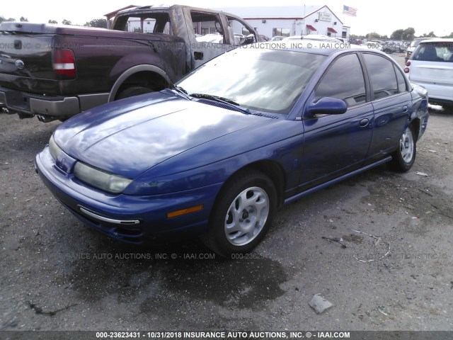 1G8ZG5289VZ338500 - 1997 SATURN SL1 BLUE photo 2