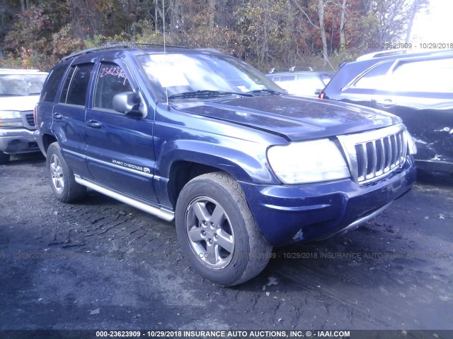 1J8GW68J44C297963 - 2004 JEEP GRAND CHEROKEE OVERLAND BLUE photo 1