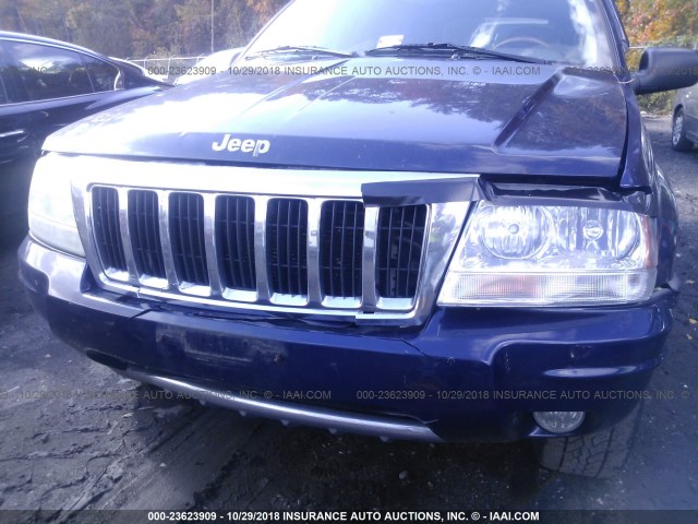 1J8GW68J44C297963 - 2004 JEEP GRAND CHEROKEE OVERLAND BLUE photo 6