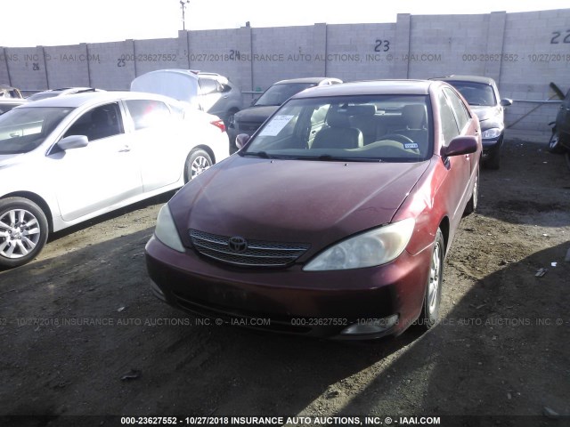 4T1BF30K63U040523 - 2003 TOYOTA CAMRY LE/XLE/SE RED photo 6