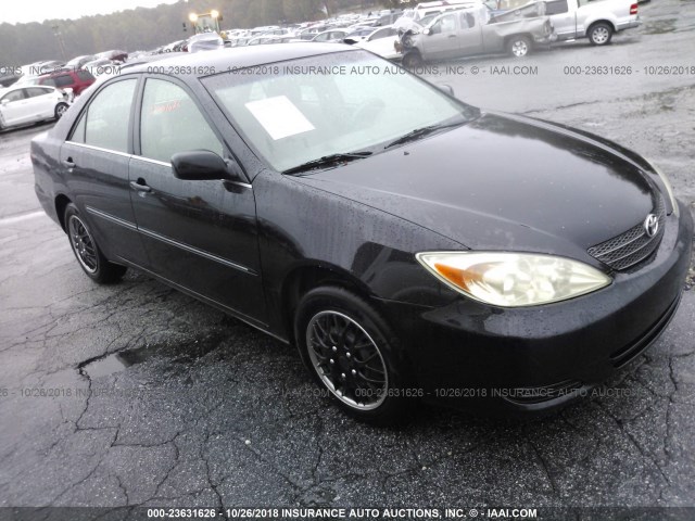 4T1BE32K82U112692 - 2002 TOYOTA CAMRY LE/XLE/SE BLACK photo 1