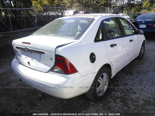 1FAFP34P13W304377 - 2003 FORD FOCUS SE/SE COMFORT/SE SPORT WHITE photo 4