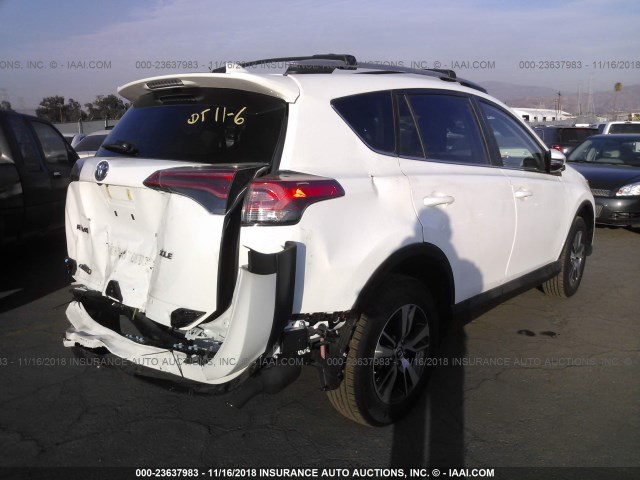 2T3WFREV0JW487117 - 2018 TOYOTA RAV4 ADVENTURE/XLE WHITE photo 4