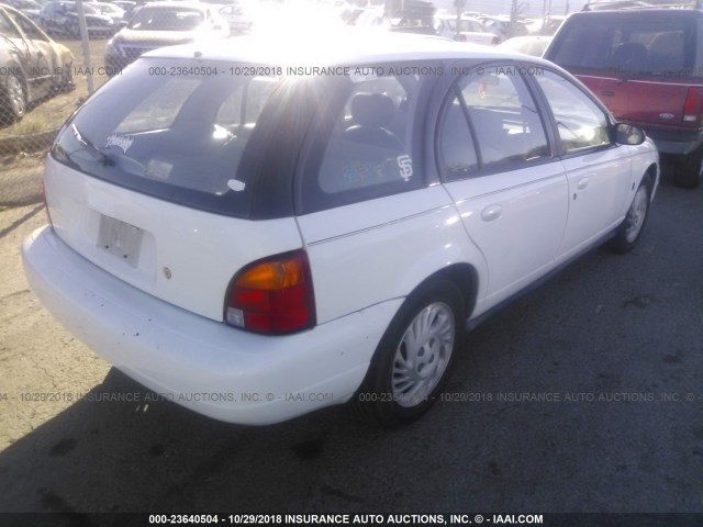 1G8ZK8278XZ243839 - 1999 SATURN SW2 WHITE photo 4