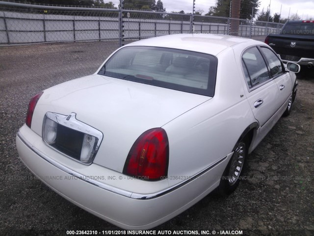 1LNHM83W5YY934072 - 2000 LINCOLN TOWN CAR CARTIER WHITE photo 4