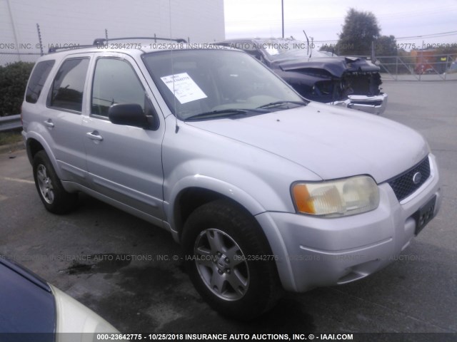 1FMCU04104KB12209 - 2004 FORD ESCAPE LIMITED SILVER photo 1