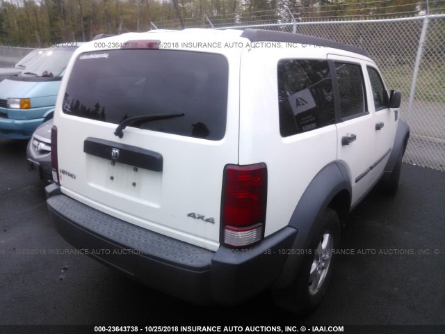 1D8GU28KX7W601509 - 2007 DODGE NITRO WHITE photo 4