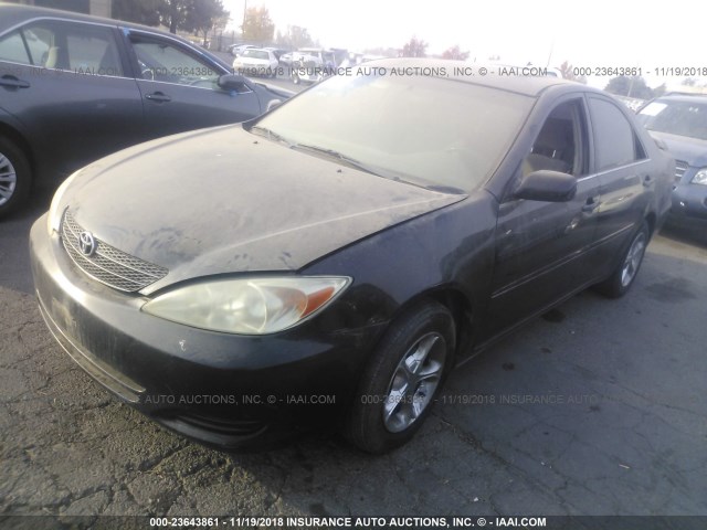 4T1BE32KX3U165136 - 2003 TOYOTA CAMRY LE/XLE/SE BLACK photo 2