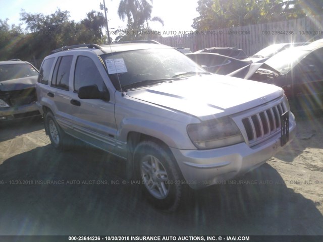 1J4GW48N34C346496 - 2004 JEEP GRAND CHEROKEE LAREDO/COLUMBIA/FREEDOM SILVER photo 1