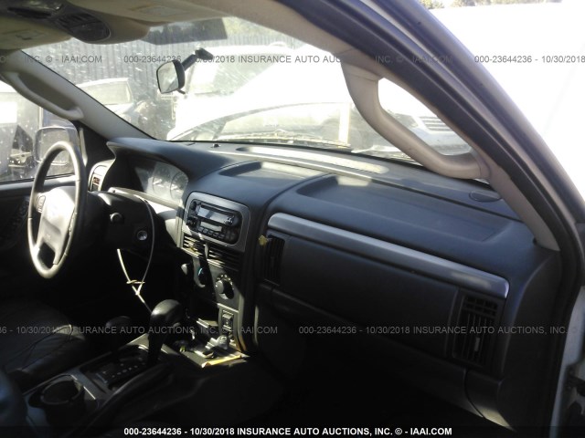 1J4GW48N34C346496 - 2004 JEEP GRAND CHEROKEE LAREDO/COLUMBIA/FREEDOM SILVER photo 5