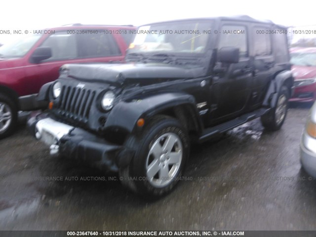 1C4BJWEG2CL224954 - 2012 JEEP WRANGLER UNLIMITE SAHARA BLACK photo 2