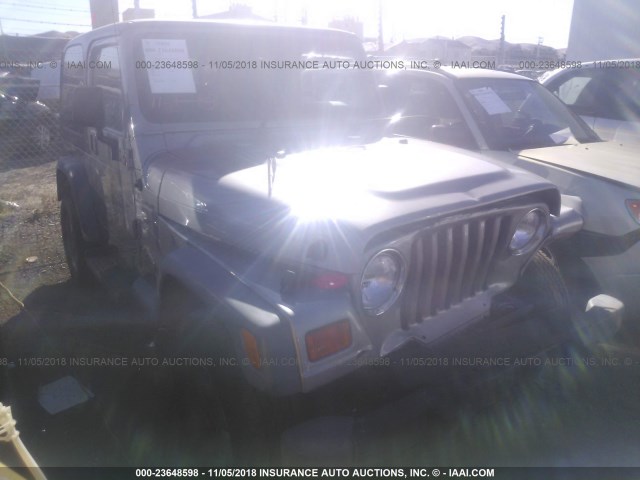 1J4FA49S7YP773340 - 2000 JEEP WRANGLER / TJ SPORT SILVER photo 1