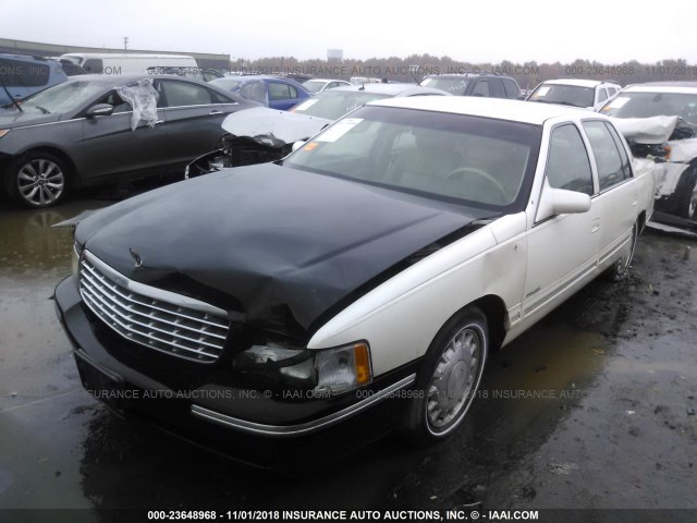 1G6KD54Y4VU231688 - 1997 CADILLAC DEVILLE WHITE photo 2