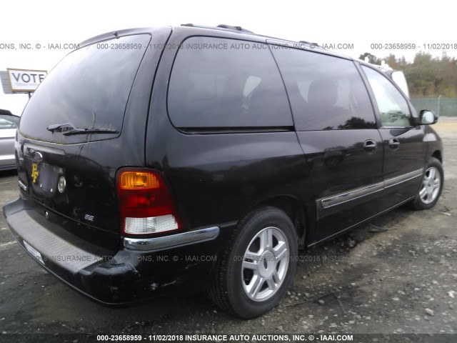 2FMZA52401BB34780 - 2001 FORD WINDSTAR SE BLACK photo 4